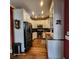Modern kitchen with stainless steel appliances and white cabinetry at 2729 Barracada Rd, Walterboro, SC 29488