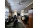Spacious living room with carpet, a ceiling fan, and lots of natural light from the windows at 2729 Barracada Rd, Walterboro, SC 29488