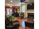 Inviting living room featuring hardwood floors, fireplace, and an abundance of natural light at 2729 Barracada Rd, Walterboro, SC 29488