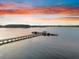 Sunset view of the bridge and boats docked at the pier at 2777 Oak Manor Dr, Mount Pleasant, SC 29466