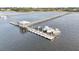 Aerial view of the community dock, featuring boat slips, boat house and expansive waterway views at 2777 Oak Manor Dr, Mount Pleasant, SC 29466