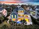 Aerial view featuring a pool, lush palm trees and covered patio with fireplace at 2777 Oak Manor Dr, Mount Pleasant, SC 29466