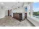 Bright, tiled bar area with doors to outside, perfect for entertaining near pool at 2777 Oak Manor Dr, Mount Pleasant, SC 29466