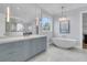 Relaxing bathroom features soaking tub, vanity, and marble floors at 2777 Oak Manor Dr, Mount Pleasant, SC 29466