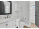 Bathroom featuring a white vanity, a black framed mirror, and a combination shower and tub unit at 2777 Oak Manor Dr, Mount Pleasant, SC 29466