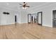 Spacious bedroom with an open view of the hall, French doors, and hardwood floors at 2777 Oak Manor Dr, Mount Pleasant, SC 29466