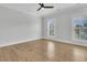 Empty bedroom featuring hardwood floors, neutral paint, and natural light at 2777 Oak Manor Dr, Mount Pleasant, SC 29466