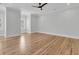 Spacious bedroom with hardwood floors, neutral paint, and a modern ceiling fan at 2777 Oak Manor Dr, Mount Pleasant, SC 29466
