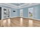 Bedroom with wood flooring, windows and door to balcony at 2777 Oak Manor Dr, Mount Pleasant, SC 29466