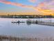 Picturesque dock extending into tranquil waters, offering serene waterfront views at 2777 Oak Manor Dr, Mount Pleasant, SC 29466