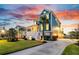 Charming two-story home featuring a spacious front yard, a welcoming porch, and a serene coastal ambiance at 2777 Oak Manor Dr, Mount Pleasant, SC 29466