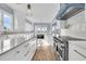 Gourmet kitchen with stainless steel appliances, white cabinets, and marble countertops at 2777 Oak Manor Dr, Mount Pleasant, SC 29466