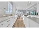 Bright kitchen features a bar area with French doors leading to a patio at 2777 Oak Manor Dr, Mount Pleasant, SC 29466