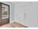 Kitchen features custom pantry storage with modern hardware and access to the patio at 2777 Oak Manor Dr, Mount Pleasant, SC 29466