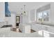 Light and airy kitchen with white cabinetry, marble counters, and a center island at 2777 Oak Manor Dr, Mount Pleasant, SC 29466