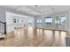 Open concept with wood floors, coffered ceiling, and access to an outdoor view at 2777 Oak Manor Dr, Mount Pleasant, SC 29466