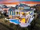 Multi-story home featuring a backyard pool, balconies, and outdoor living space with beautiful sunset skies at 2777 Oak Manor Dr, Mount Pleasant, SC 29466