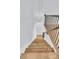 Hardwood staircase with metal railing leading to the lower level at 2777 Oak Manor Dr, Mount Pleasant, SC 29466