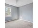 Bedroom with carpet and a window letting in natural light at 305 Meadowlark Ln, Moncks Corner, SC 29461