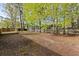 A huge backyard area featuring a new deck and fence with ample space at 317 Commons Way, Goose Creek, SC 29445