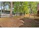 Large backyard with a newly built deck and privacy fence at 317 Commons Way, Goose Creek, SC 29445