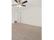Neutral carpeted bedroom with ceiling fan and two doors at 317 Commons Way, Goose Creek, SC 29445