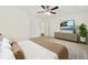 Nicely decorated staged bedroom with TV and plant at 317 Commons Way, Goose Creek, SC 29445