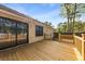 Wooden deck with railings and a view of the backyard at 317 Commons Way, Goose Creek, SC 29445