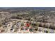 An aerial view shows the home's location nestled among trees and near a pond in a quiet neighborhood at 3199 Great Egret Dr, Johns Island, SC 29455