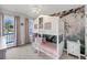 Stylish bedroom with a whimsical bunk bed and floral wallpaper at 3199 Great Egret Dr, Johns Island, SC 29455