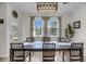Bright dining room featuring natural light, modern lighting fixture, and hardwood floors at 3199 Great Egret Dr, Johns Island, SC 29455