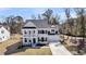 Charming two-story home features a manicured lawn, attached two-car garage, and a welcoming front porch at 3199 Great Egret Dr, Johns Island, SC 29455