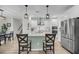 Modern kitchen with stainless steel appliances, a central island, and stylish pendant lighting at 3199 Great Egret Dr, Johns Island, SC 29455