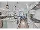 Open kitchen featuring an island, quartz countertops, and stainless steel appliances at 3199 Great Egret Dr, Johns Island, SC 29455