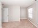 Bedroom featuring neutral carpet and a window at 3529 Galaxy Rd, Ladson, SC 29456