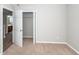 Bedroom featuring neutral carpet with an open closet and view to bathroom at 3529 Galaxy Rd, Ladson, SC 29456