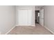 Bedroom featuring neutral carpet, a closet, and view into hall at 3529 Galaxy Rd, Ladson, SC 29456
