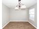 Dining room featuring laminate floors, a window with natural light, and fresh neutral-colored paint at 3529 Galaxy Rd, Ladson, SC 29456