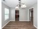 Open dining room featuring hardwood floors and access to the kitchen at 3529 Galaxy Rd, Ladson, SC 29456