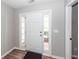 Bright entryway featuring a white front door with sidelights and neutral-toned walls at 3529 Galaxy Rd, Ladson, SC 29456