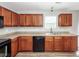 Efficient kitchen layout showcasing cabinets, ample counter space, and contemporary fixtures at 3529 Galaxy Rd, Ladson, SC 29456