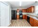 Well-equipped kitchen with ample cabinet space, modern appliances, and durable laminate flooring at 3529 Galaxy Rd, Ladson, SC 29456