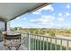 Relaxing balcony with seating overlooking a serene marsh landscape, perfect for outdoor enjoyment at 3701 Docksite Rd # 108, Edisto Beach, SC 29438