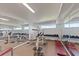 Well-equipped home gym with mirrored walls and a range of weightlifting and exercise equipment at 3701 Docksite Rd # 108, Edisto Beach, SC 29438