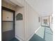 Exterior hallway leading to residences, covered from the elements, and featuring outdoor carpeting at 3701 Docksite Rd # 108, Edisto Beach, SC 29438