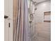 Modern shower with brushed nickel fixtures, including a rain shower head and a built-in niche at 3701 Docksite Rd # 108, Edisto Beach, SC 29438