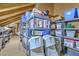 Well-organized attic storage with plastic containers and shelving at 406 Summers Dr, Summerville, SC 29485