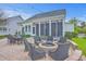 Charming backyard with brick patio, fire pit, and cozy seating area for outdoor enjoyment at 406 Summers Dr, Summerville, SC 29485