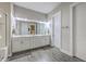 Elegant bathroom featuring dual sinks, granite countertops, and a glass-enclosed shower at 406 Summers Dr, Summerville, SC 29485