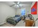Bedroom with single bed, desk, ceiling fan, and decor at 406 Summers Dr, Summerville, SC 29485